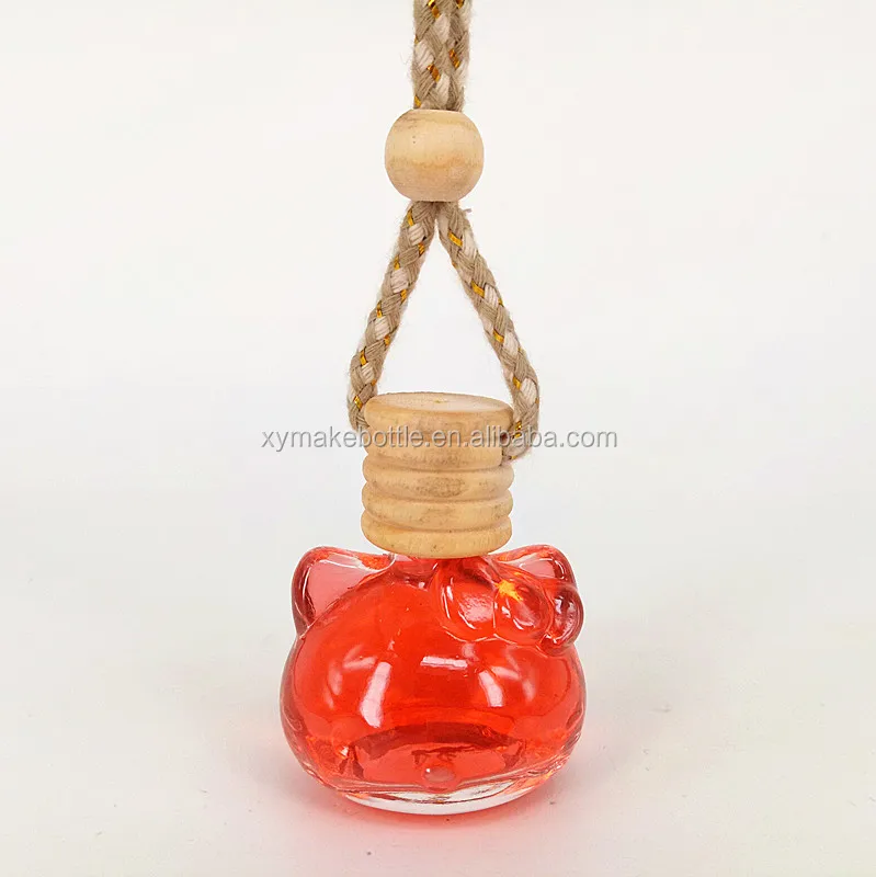 hello kitty hanging car perfume bottle with wood cap