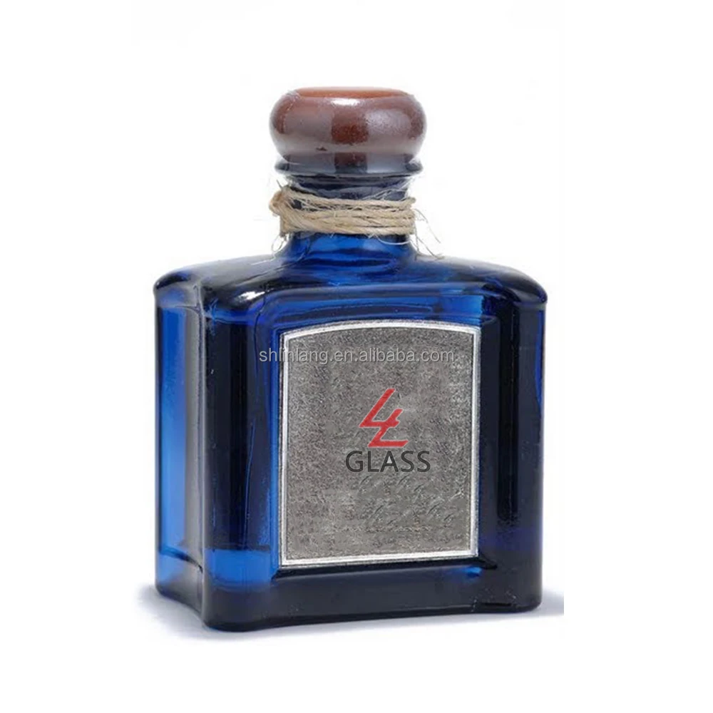Shanghai Linlang customized Luxury heart shape tequila blue bottle tequila glass bottle