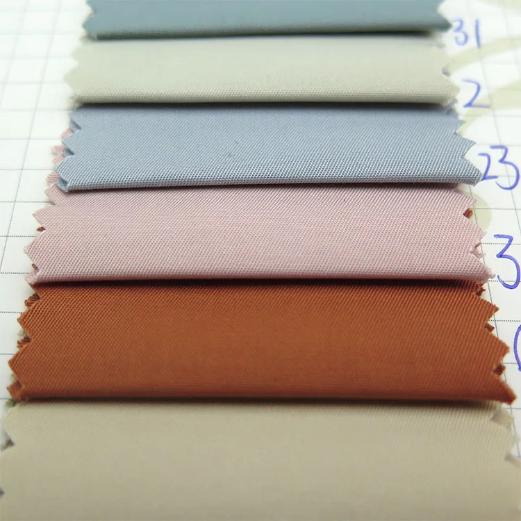 Wholesale Retail Ready Stock Polyester Cotton Interwoven Parker Windbreaker Jacquard Fabric Down Jacket Fabric Fashion Fabric