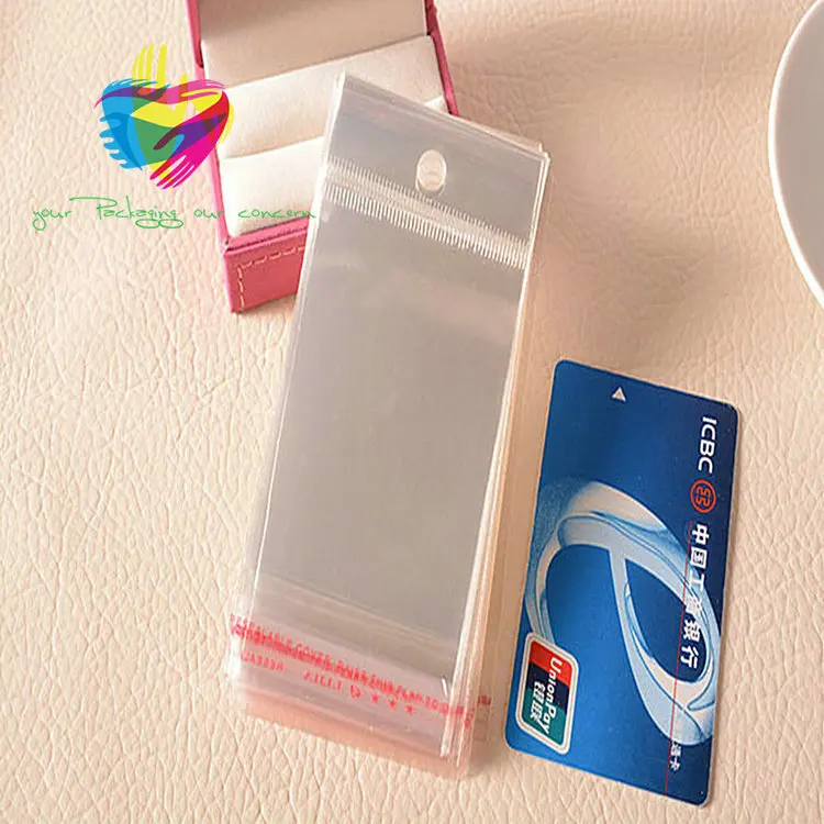 Yiwu cheap transparent header opp plastic bag with card for things