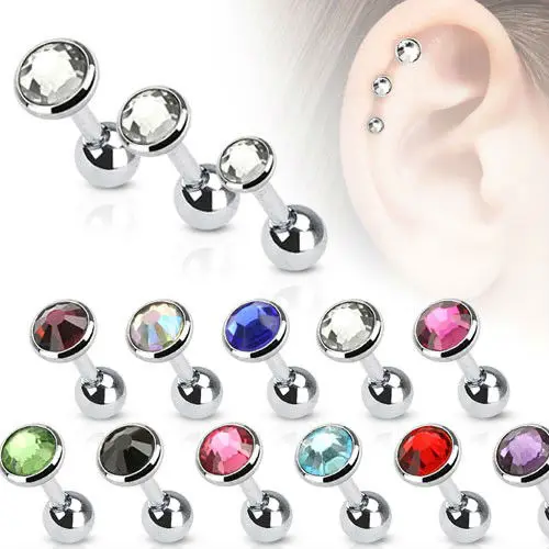 Jeweled ear tragus piercing with helix piercing