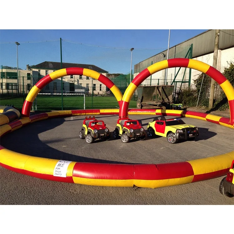 Cheap outdoor commercial sport games bumper cars speedway racing track inflatable go kart zorb ball race track for sale