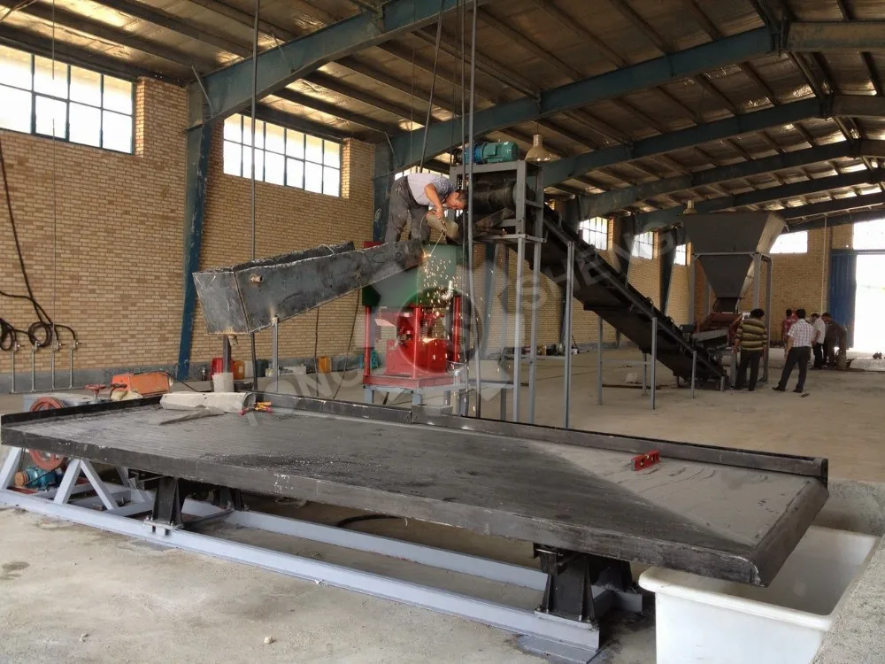 Alluvial fine gold separator densimetric table