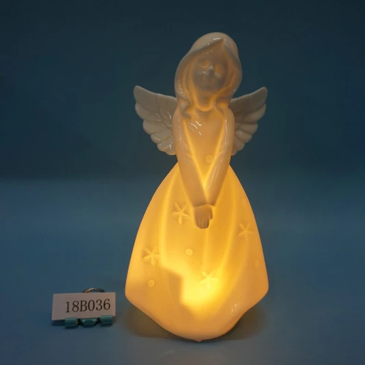 White porcelain angle figurine with light