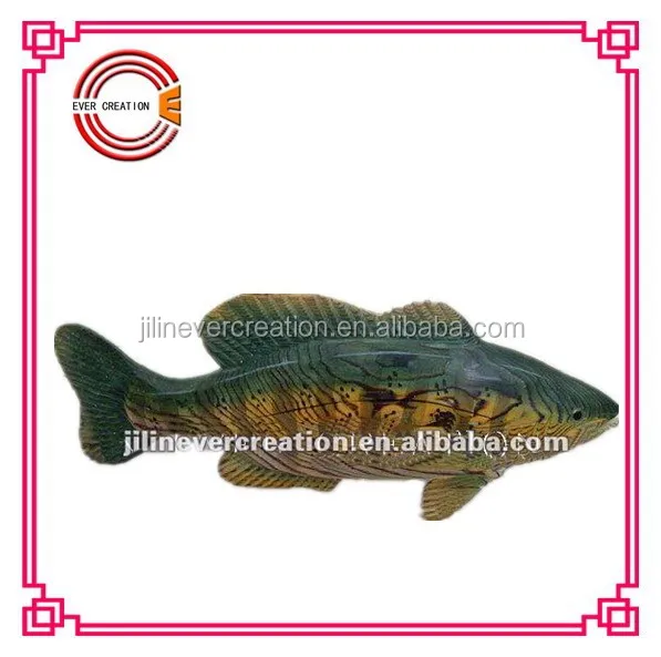 wooden hand craved fish decoration