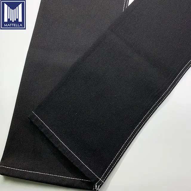 cheap wholesale stock price black warp black weft waxed 75% cotton 25% polyester blend denim fabric