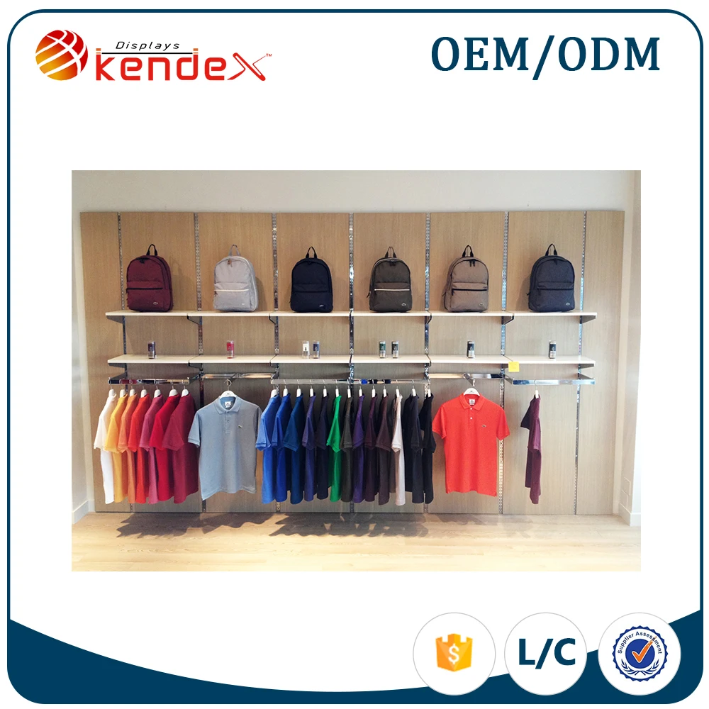 
wall mounted metal T-shirt and backpack display shelf for kiosk advertising 