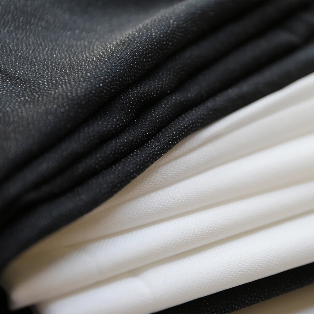 Плавкие ткани производители одежды Флизелин сплетенные ткани 100D300D