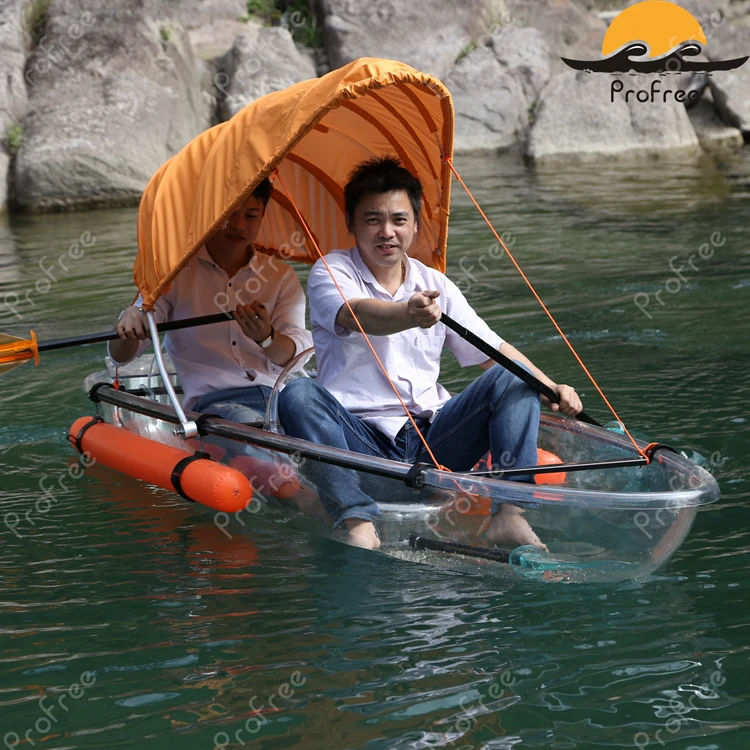 
transparent kayak with outrigger and airbag ans fishing life jacket 