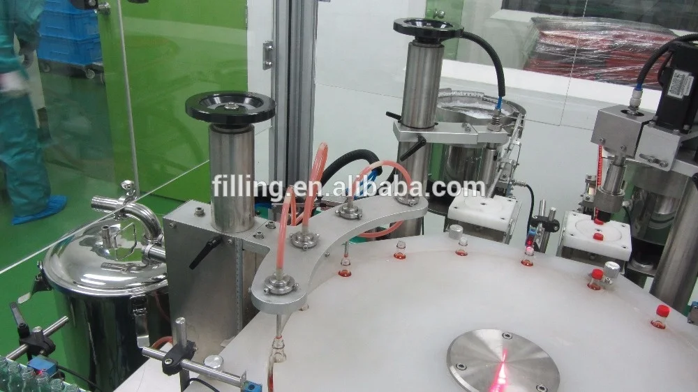 Mechanical hand style double-head filling and capping machine DTNX-60Y type