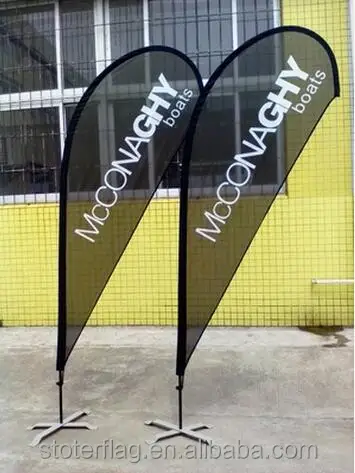 
Flying Style and Fiberglass Flagpole outside beach flags 