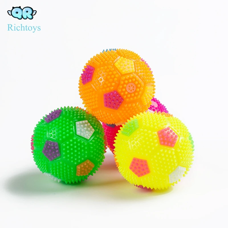 Hot selling flashing football shaped spiky ball toy for kids