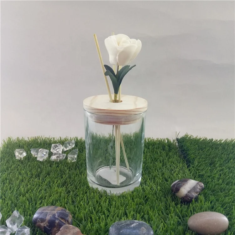 
2019 popular new design unique reed diffuser glass cup/glass jar with wooden lid with hole 