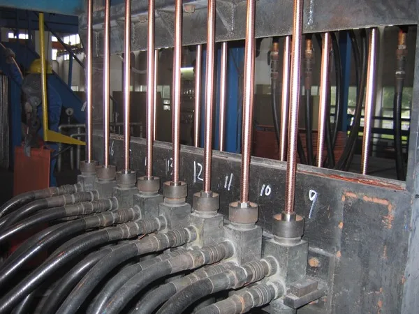 Upcast metal continuous casting machine for copper rod