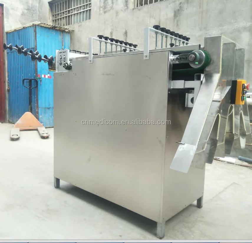 Surgical cotton ball making machine