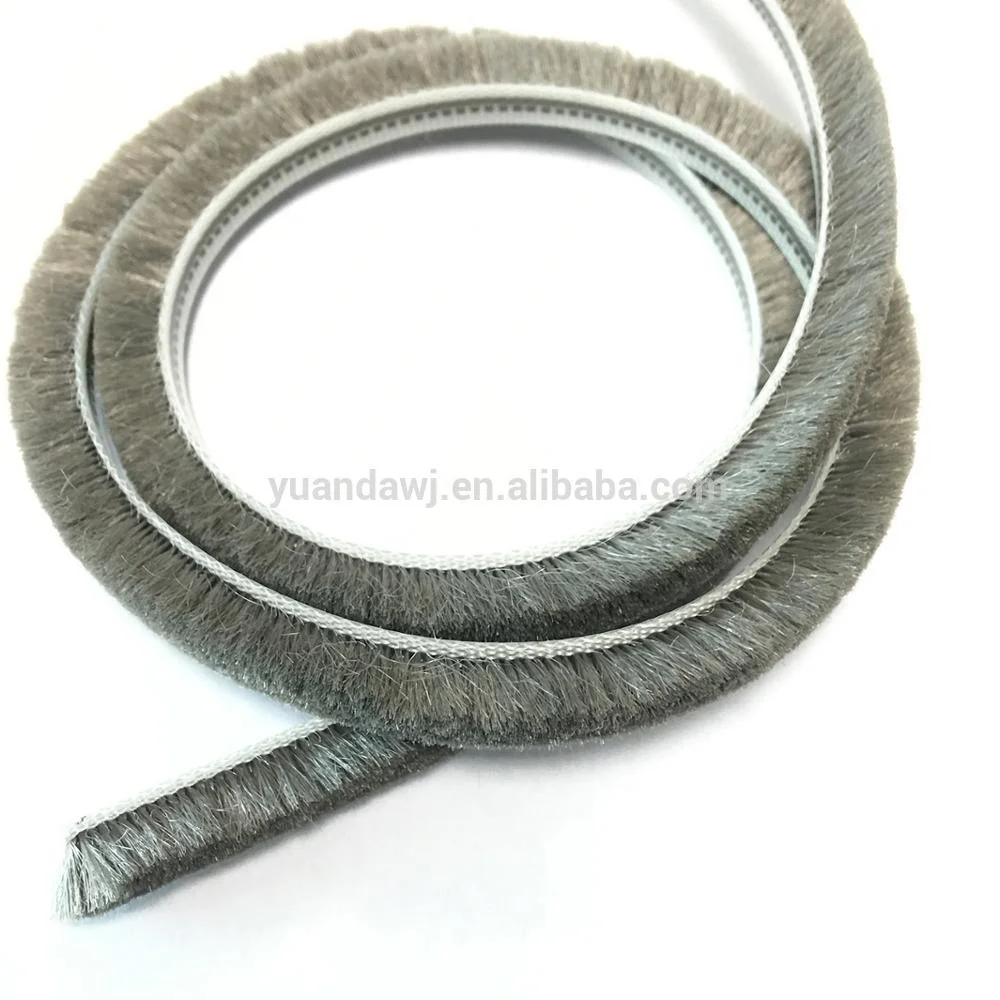 Wool pile weather seal strip door
