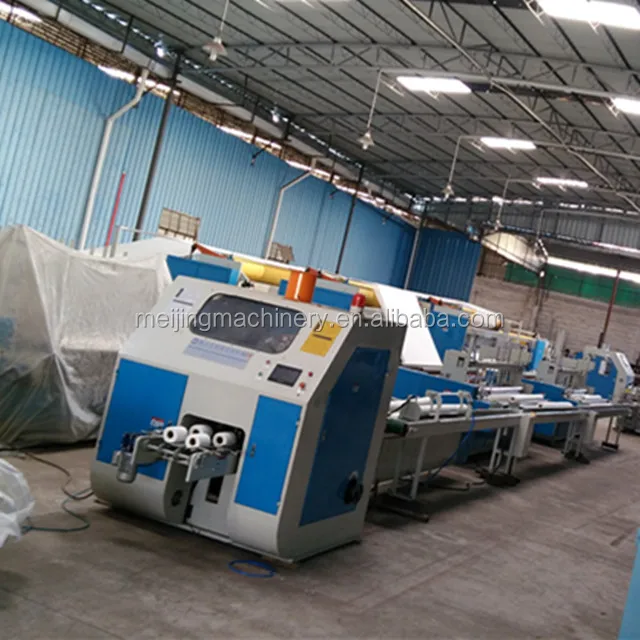Toilet paper and kitchen paper production line 2 rewinders with double lamination and magazine saw cutting
