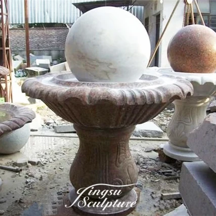 Hand carved granite spinning ball water fountain
