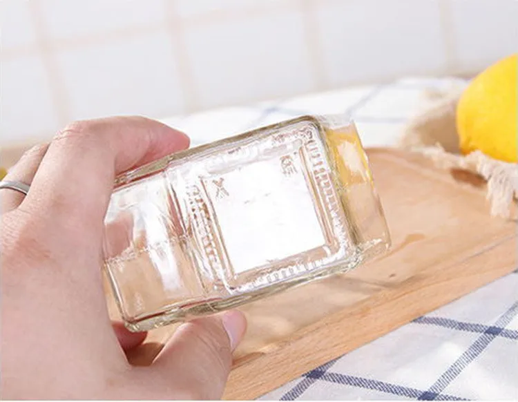 Оптовая продажа 100 мл шестигранная пустая Роскошная стеклянная банка для хранения меда с деревянной крышкой