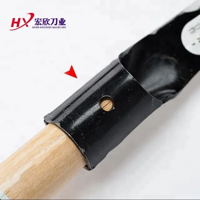 Tree cut with wooden handle mows outdoor pruning agricultural