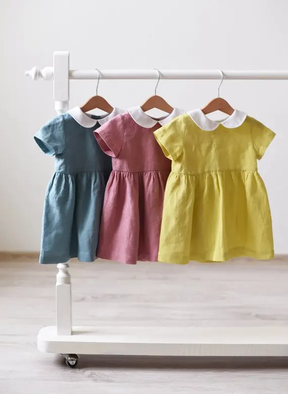 
Classic baby girl linen cotton dress short sleeves yellow little girl outfits plain peter pan collar ruffle fancy baby frocks de 