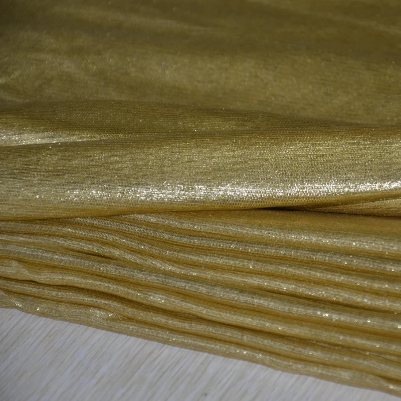 
silk gossamer golden shiny silk tulle fabric with foil 
