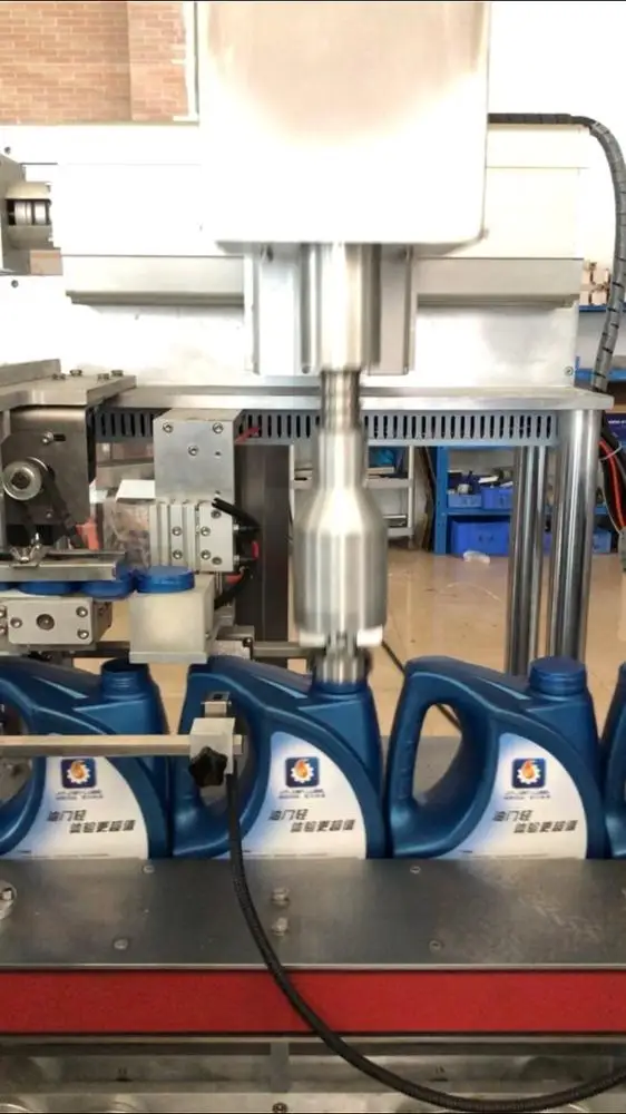 
Bottle packing machine Automatic Capping Machine for Bottle Tracking Type 2000-3000BPH 
