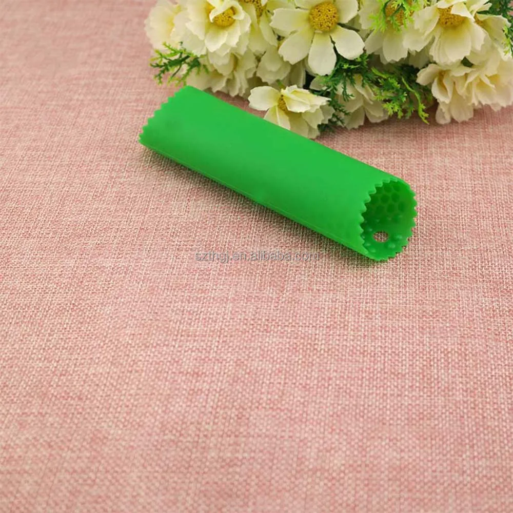 Attractive innovative silicone garlic peeler with dots inside