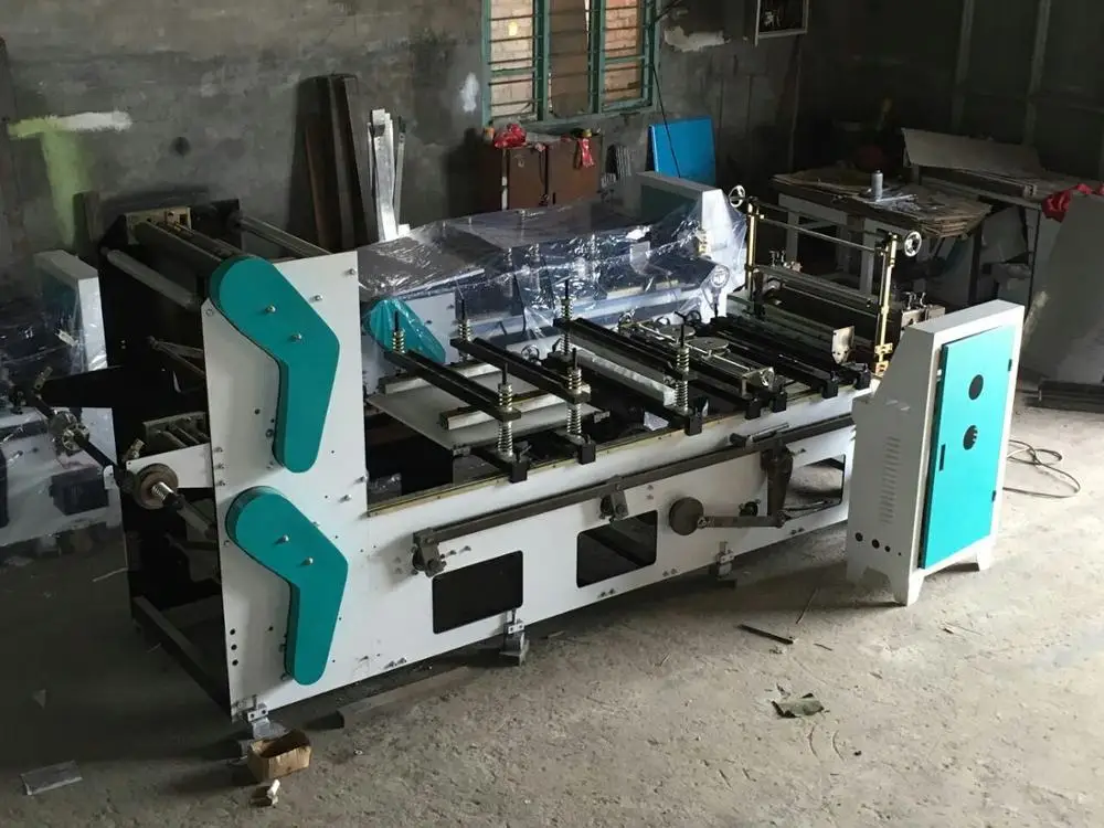 China simpler type three side seal pouch vacuum bag making machine