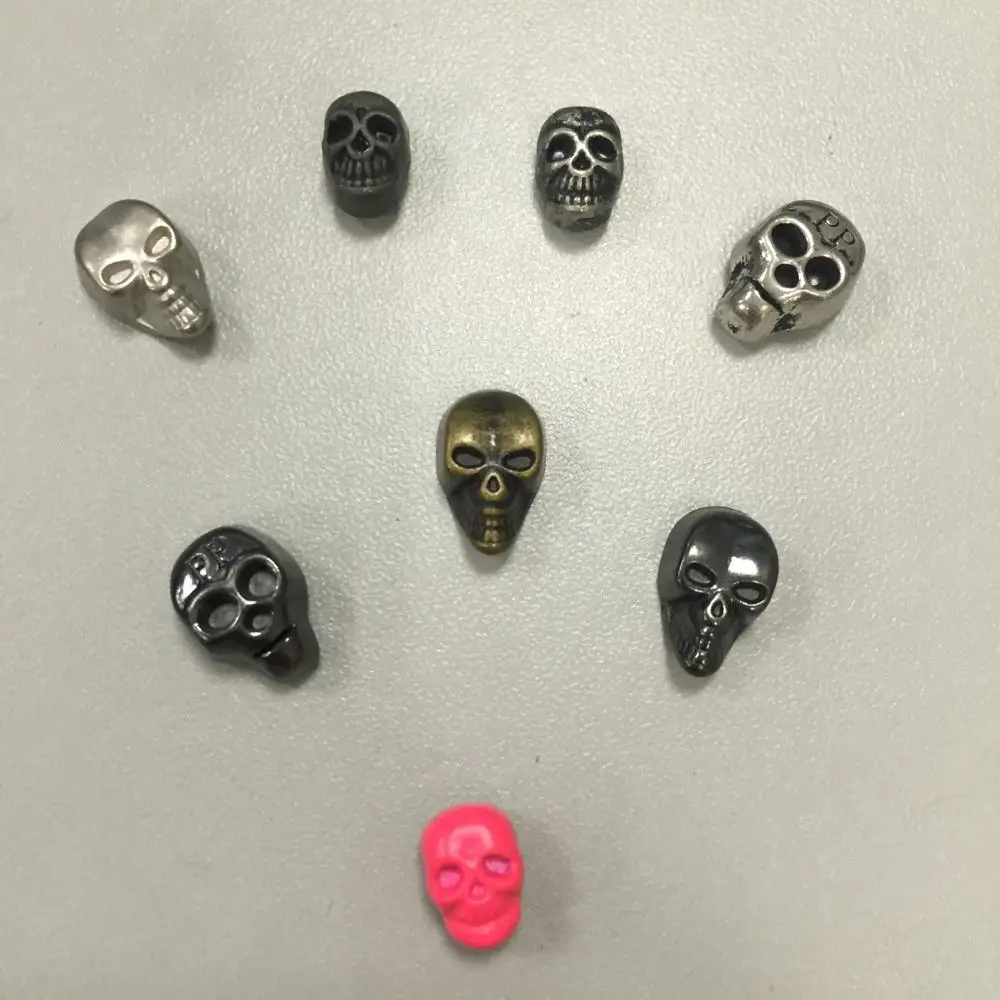 wholesale cool skull shape metal rivet with PP logo for garment