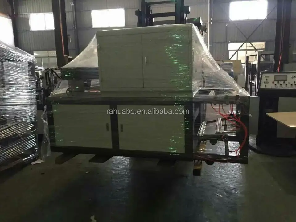 Full Automatic CE,ISO9001Factory price Nonwoven bag making machines t-shirt bag on roll making machine price popular in India
