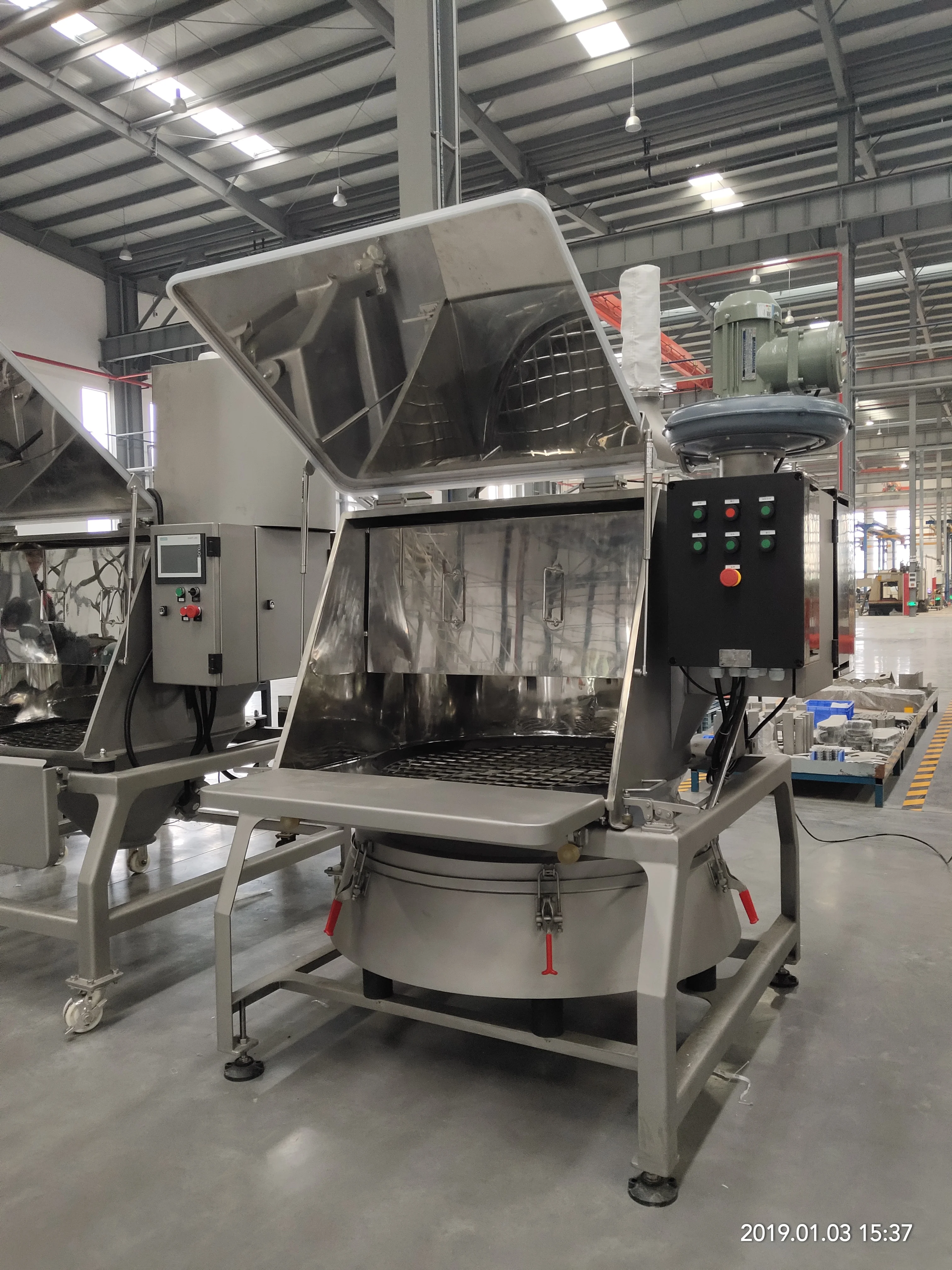 
Powder material bag dump station 