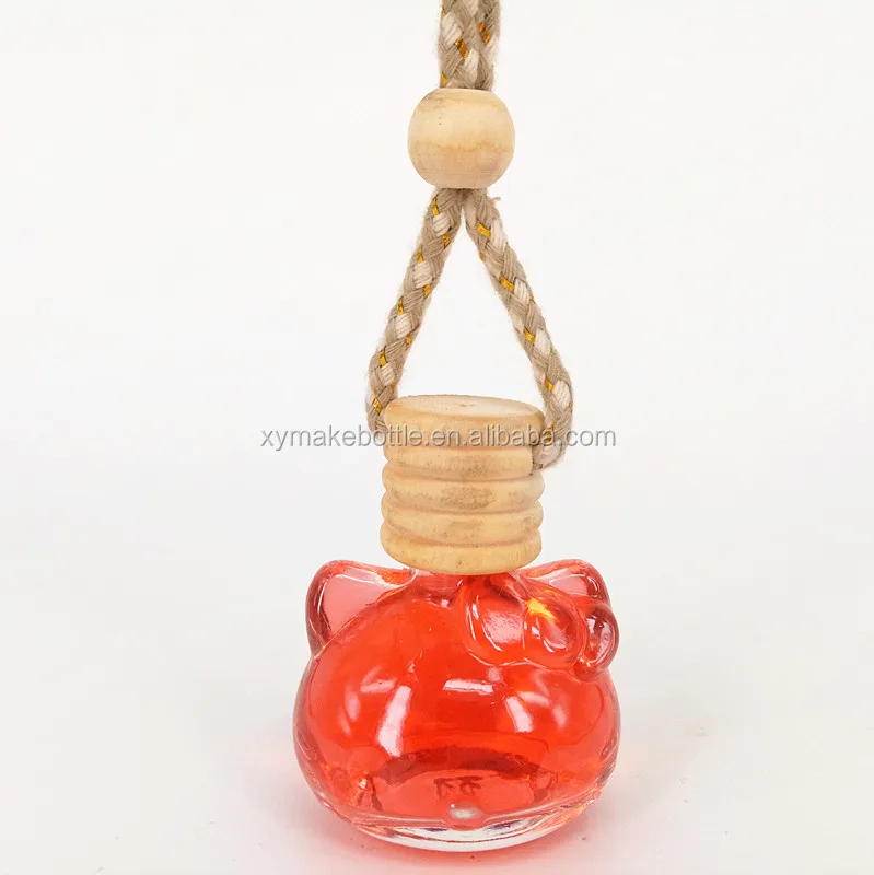 hello kitty hanging car perfume bottle with wood cap