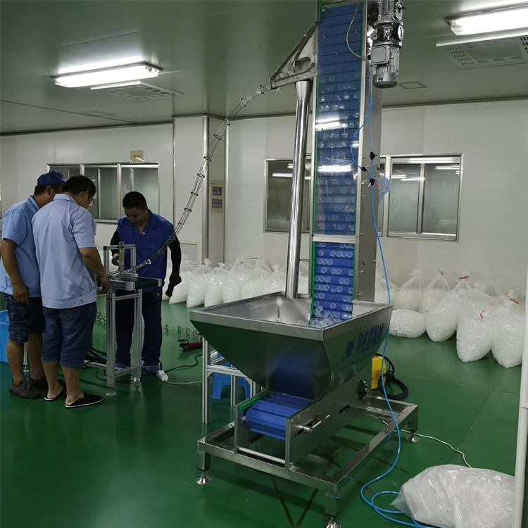 Full Automatic Vibratory Silicone Flower Cap Feeder Machine For Sale
