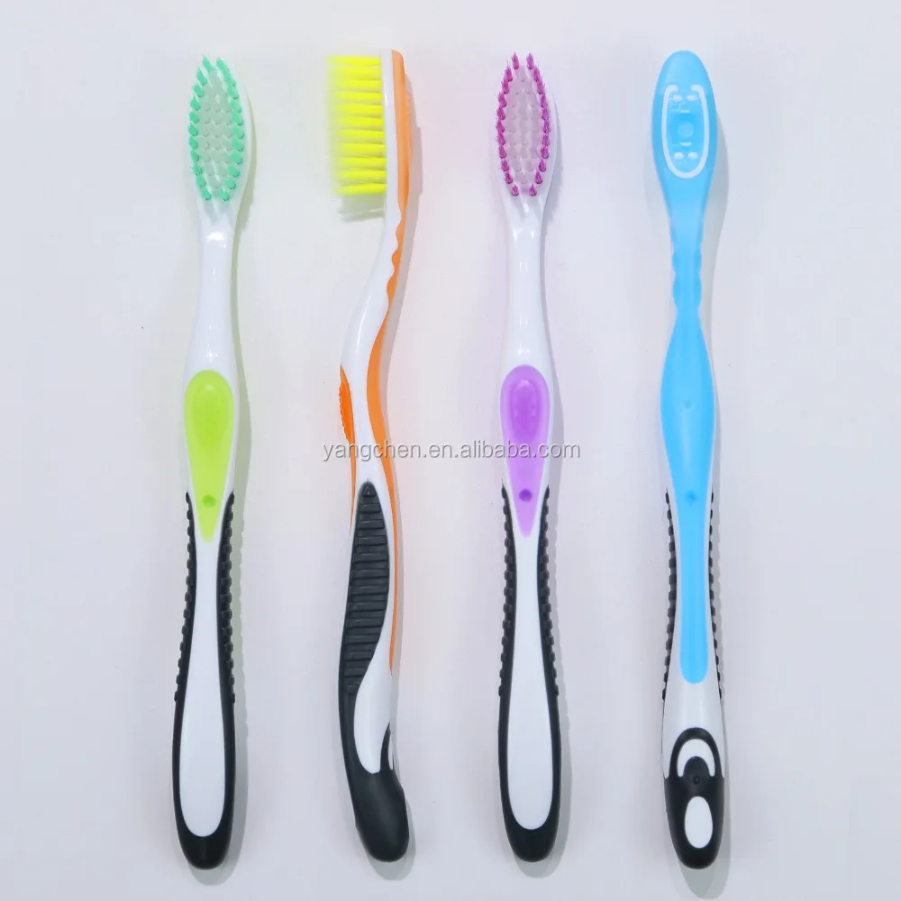 Chinese soft bristled adult toothbrush with tongue cleaner from yangchen factory China supplier