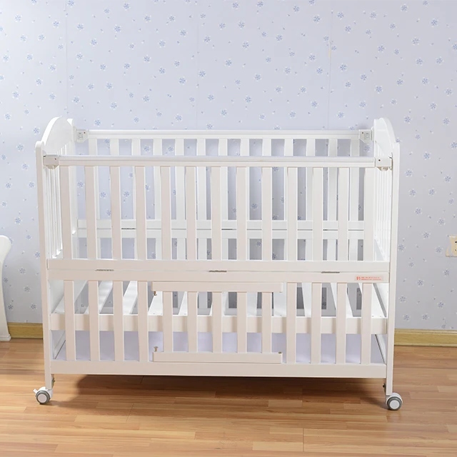 Adjustable New Zealand white painting pine wood baby cot wheels baby crib cot bed rail for baby sleep