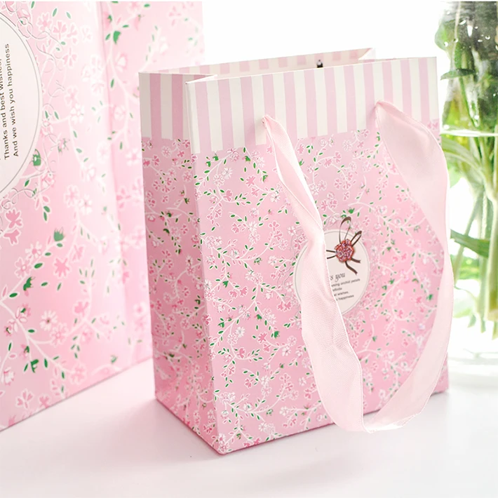 Fashion printed logo fancy shopping paper gift bag with rope
