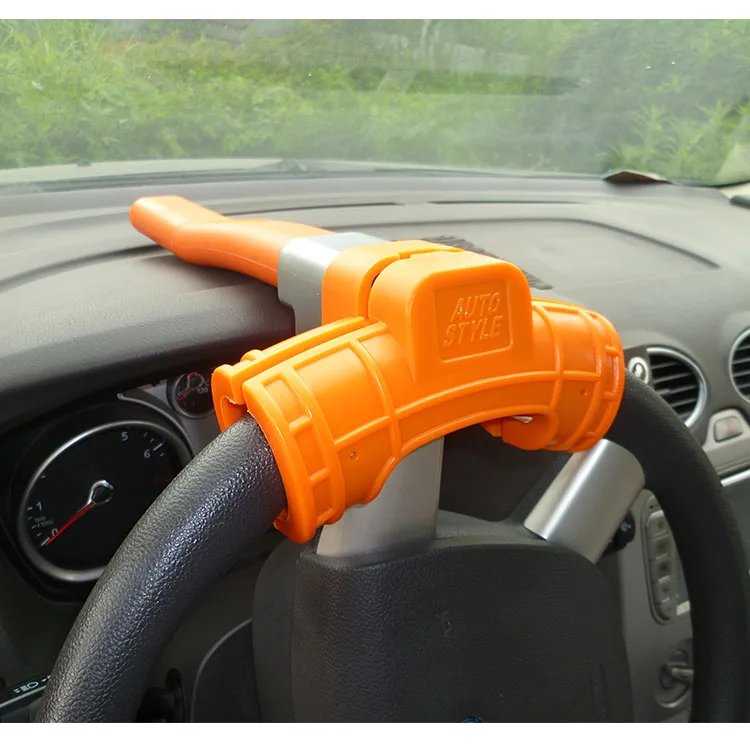 Новый замок на руль для автомобиля с оранжевым пластиковым чехлом