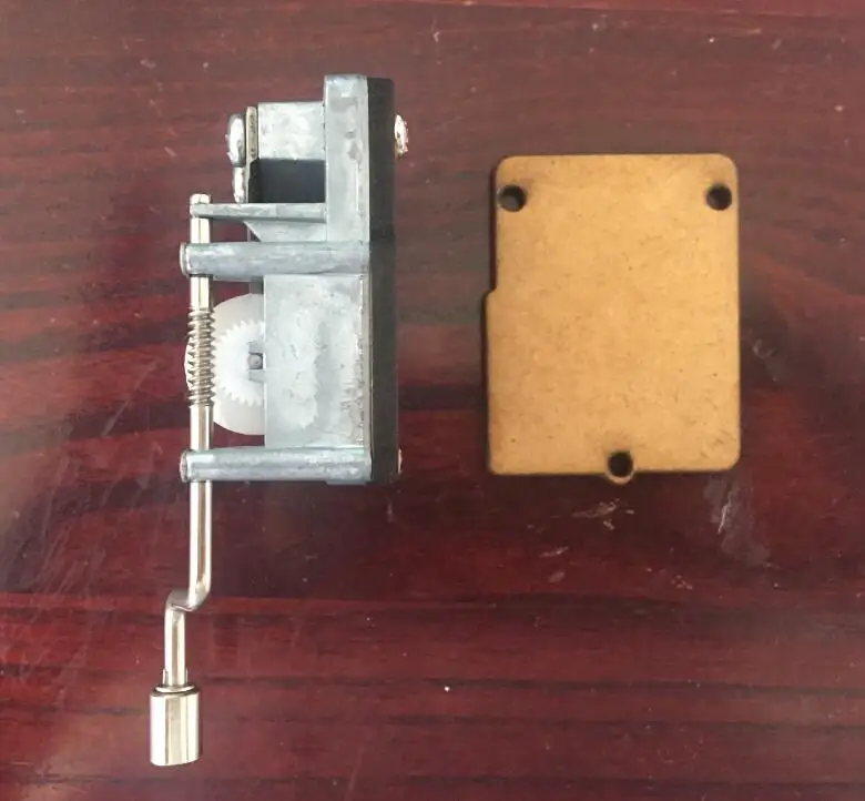 Hand crank music box mechanism with the wood board