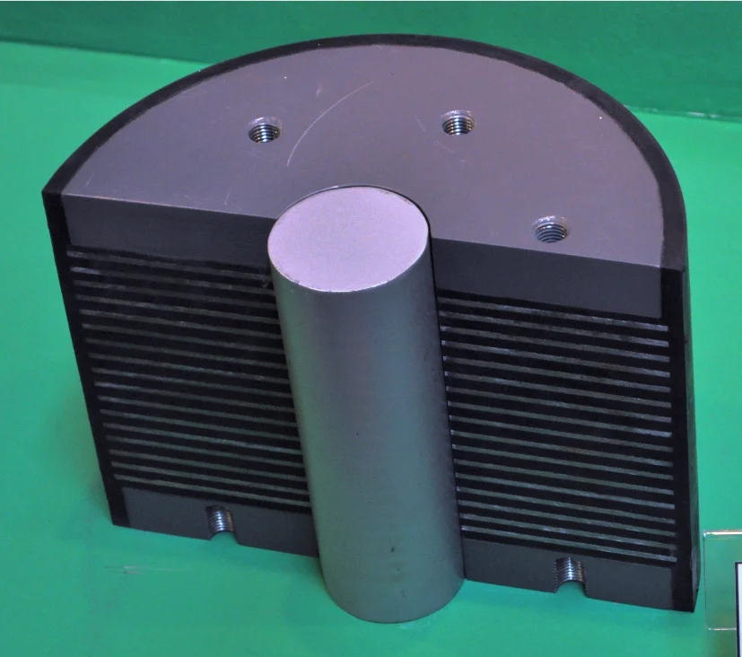 Rubber type bearing with lead plug for bridge