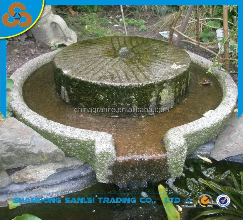 Sale real old millstone outside steps stone