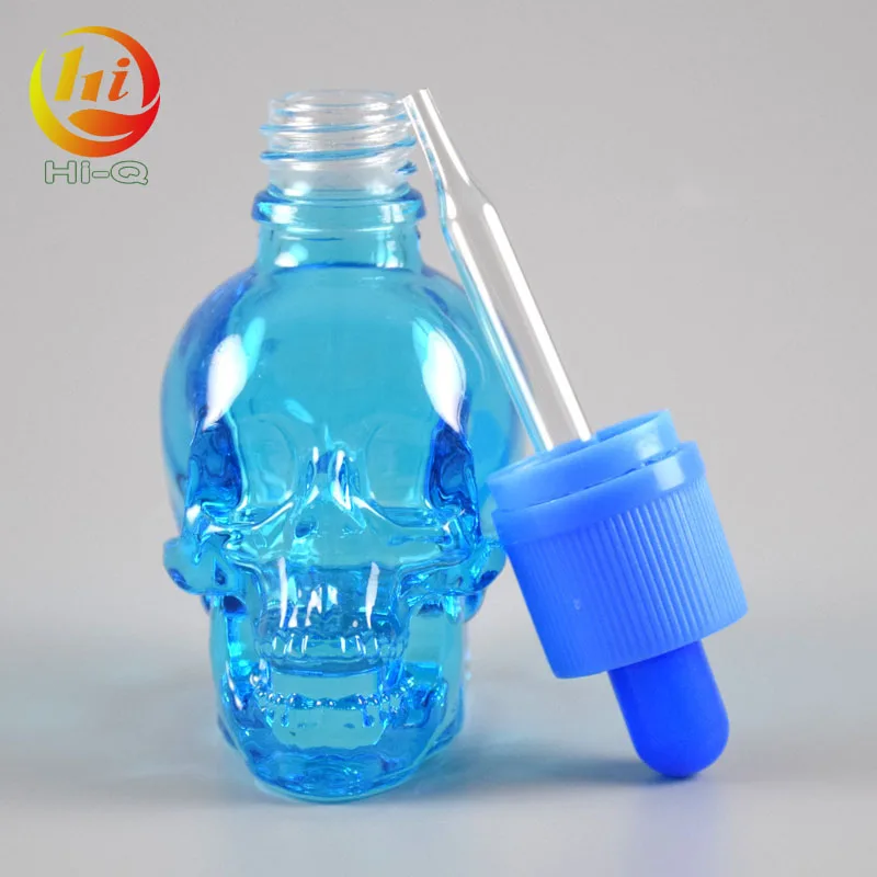 unique shape glass liquid bottle 15ml 30ml 50ml clear skull glass dropper bottle