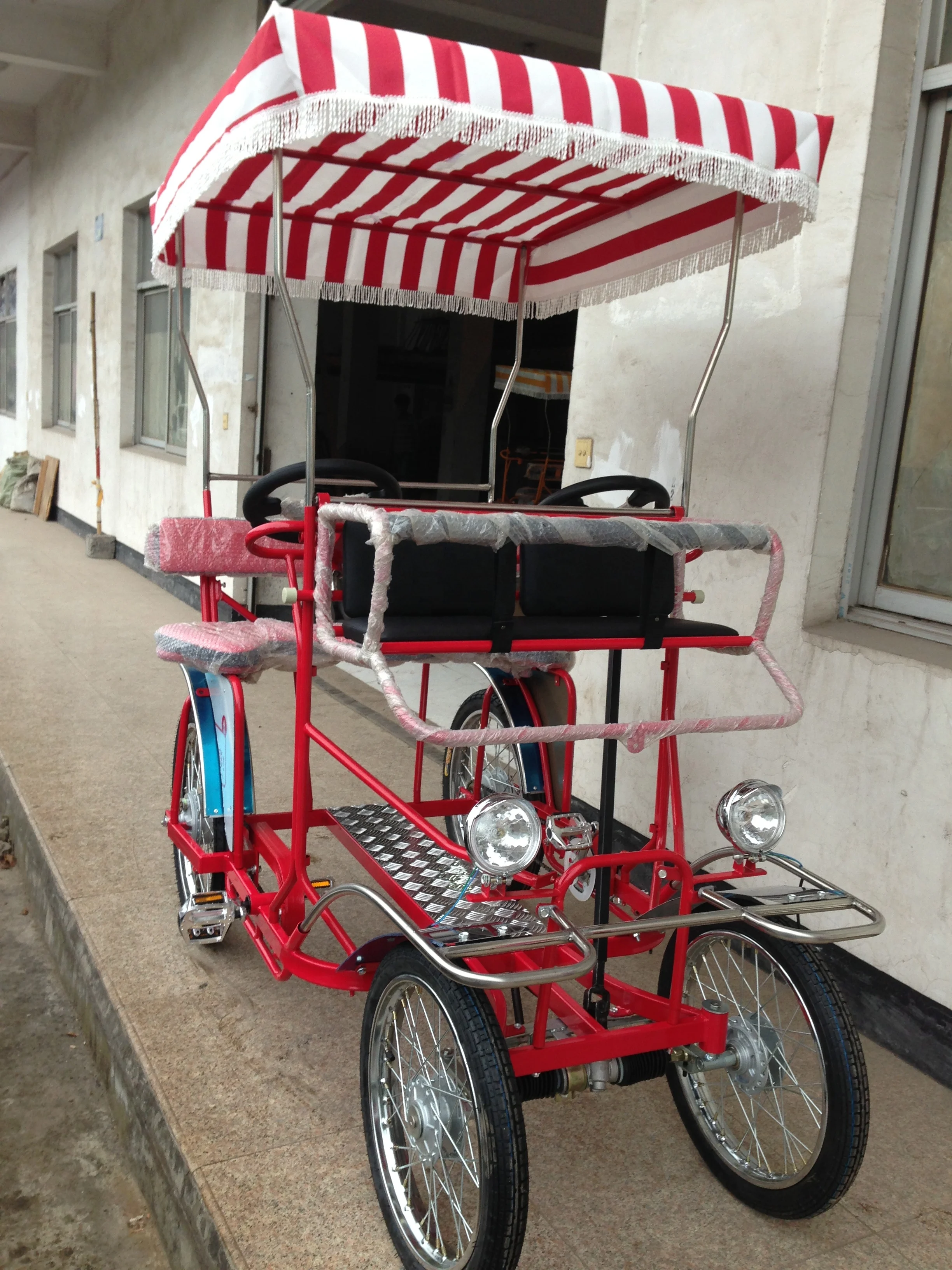 special transportation 2personS 4wheels  SURREY BIKE WITH LED LIGHT AND FRONT BABY SEAT  SURREY QUADRICYCLE