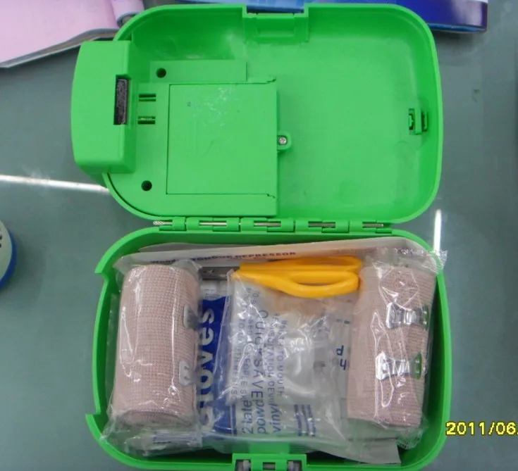 
first aid kit with medical items for household safety 