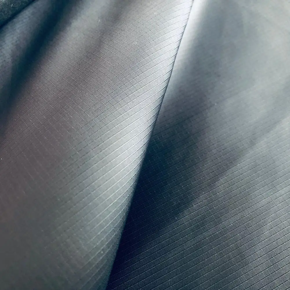 
100% polyester taffeta 66D*66D with 210T strong waterproof rib-stop 2*2 mm PU film 