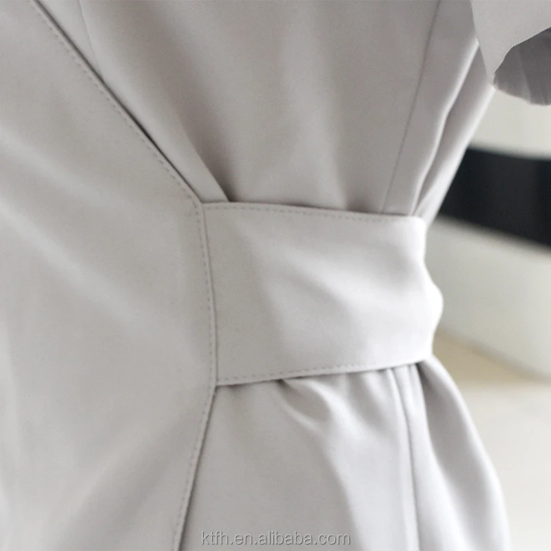 Fashionable stylish hair dressers make up nail artist profession wrap work tunic