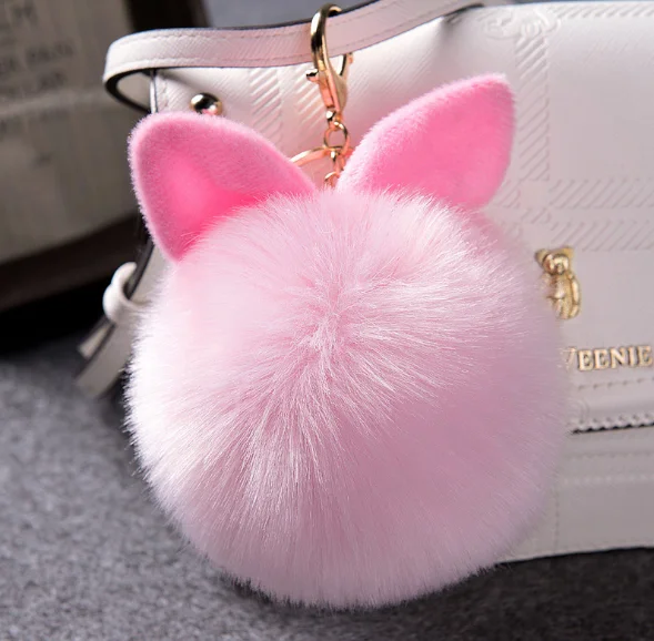 
faux fur pompom with ear keychain for bag hanging pink color 