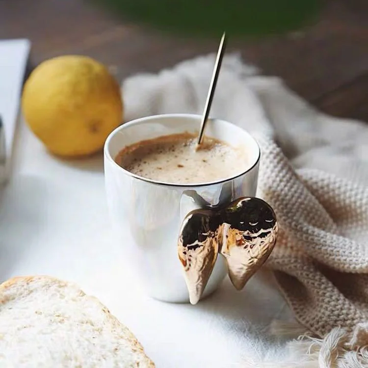 Handmade ceramic golden angel wings coffee cup mug