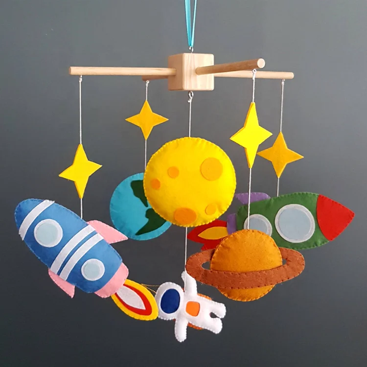 DIY felt hanging crib decoration with rocket and spaceman shape