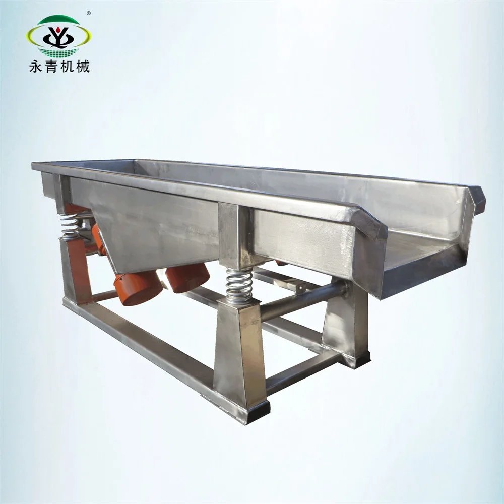 Vibrating feeder conveyor with vibration motors for grain processing